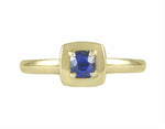 18k green gold ring with blue sapphire