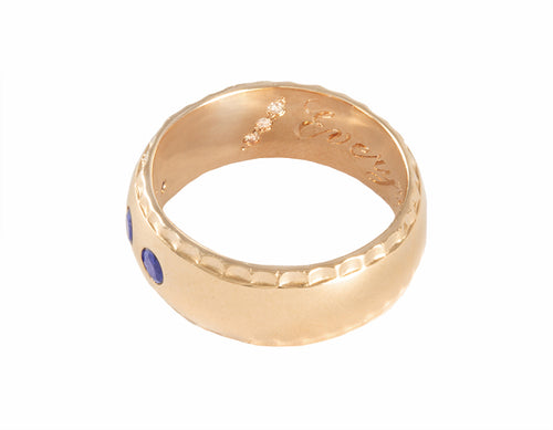 solid 14k gold man's band with sapphires and diamonds