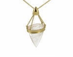 Very large pendant in yellow gold with large clear gem with golden needles inside. On gold chain.