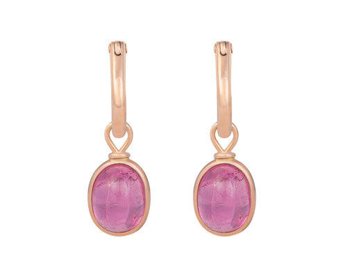 Small oval drops in rose gold with pink cabochon gems.  Drops hang on small U shaped hoops in solid rose gold.