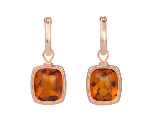 Rectangle bright orange gems in rose gold frame. Drops hang from small U shaped hoops in rose gold.
