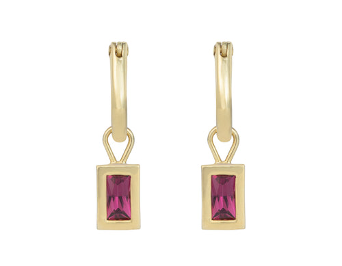 Small rectangle bright raspberry red gems in green gold frame. Drops hang from small U shaped hoops in green gold.