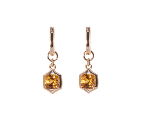 Square drops with light orange gems in rose gold frame. Drops hang on small U shaped hoops in solid rose gold.