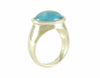 Aquamarine cabochon in 18k green gold ring