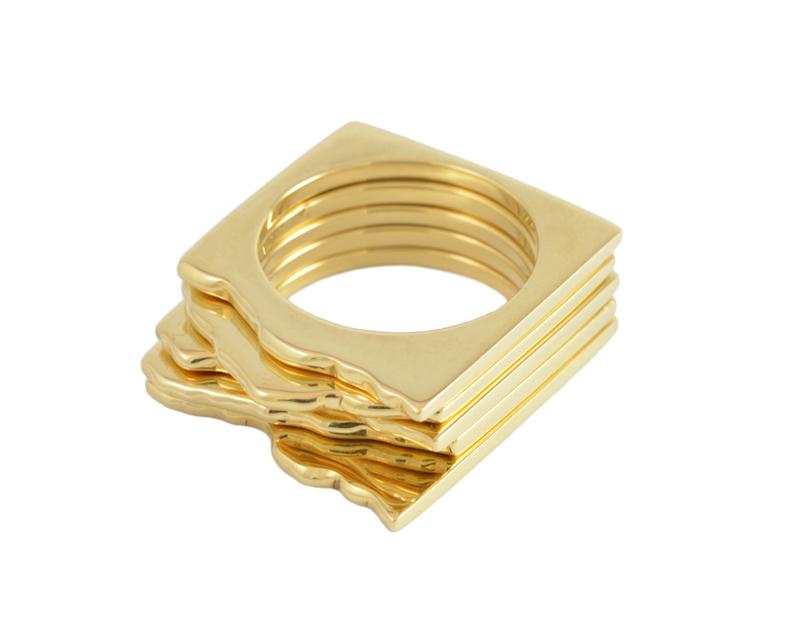 Stack of five square rings looking like mountains.