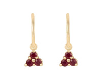 Pair of yellow gold studs in the shape of a bunch of grapes carved in detail in relief. Hanging from the bottom are trios of round red rubies forming a triangle.
