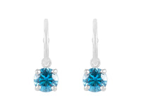 Natural blue zircon drops on platinum hoops.