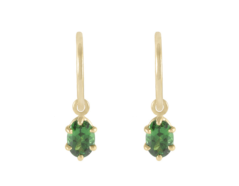 Oval, green tsavorite garnet drops on 18k yellow gold hoops.