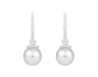 Pearl drops hung on platinum hoops.