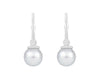 Pearl drops hung on platinum hoops.