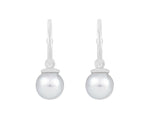 Pearl drops hung on platinum hoops.