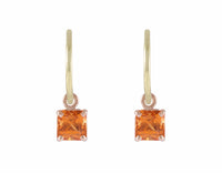 Bright orange spessartite garnet drops in 18k rose gold on 18k green gold hoops