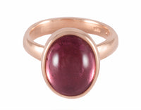18 karat rose gold ring with a cabochon of pink tourmaline