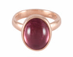 18 karat rose gold ring with a cabochon of pink tourmaline