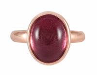 18 karat rose gold ring with a cabochon of pink tourmaline