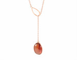 Hessonite garnet pendant, odd shape, adjustable, set in 18k and hung on 14k rose gold chain