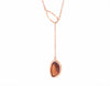 Hessonite garnet pendant, odd shape, adjustable, set in 18k and hung on 14k rose gold chain