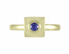 18k green gold ring with purple-blue sapphire
