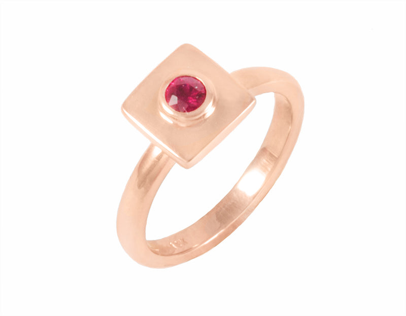 18k rose gold ring with small ruby