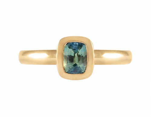 Yellow 18k gold ring with bi-colour sapphire