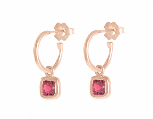 Delicate garnet drops on 18k rose gold hoops.