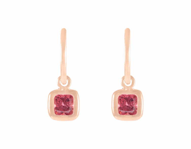 Delicate garnet drops on 18k rose gold hoops.