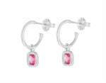 Neon pink spinel drops on platinum hoops