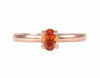 18k green and rose gold rings with spessartite and rhodolite garnets