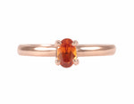 18k green and rose gold rings with spessartite and rhodolite garnets