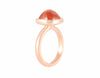 18k rose gold ring with spessartite garnet cabochon.
