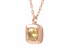 Warm honey coloured natural zircon gem set in 18k rose gold on rose gold chain.