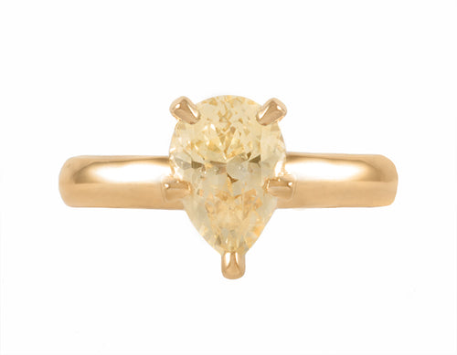 18k yellow gold ring with pear-shaped yellow sapphire