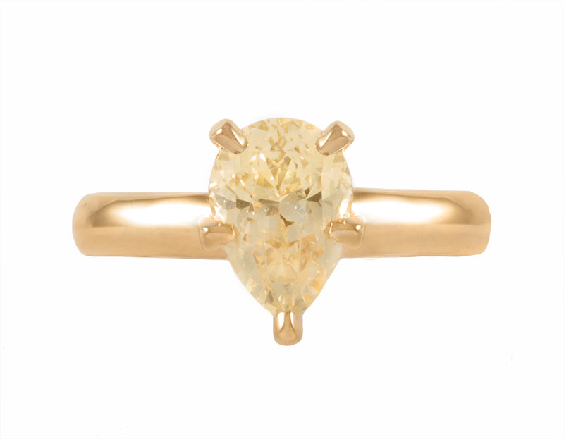 18k yellow gold ring with pear-shaped yellow sapphire