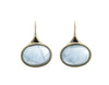 Medium oval light blue aquamarine cabochons in green gold frame and shepherd's hooks.