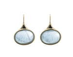 Medium oval light blue aquamarine cabochons in green gold frame and shepherd's hooks.