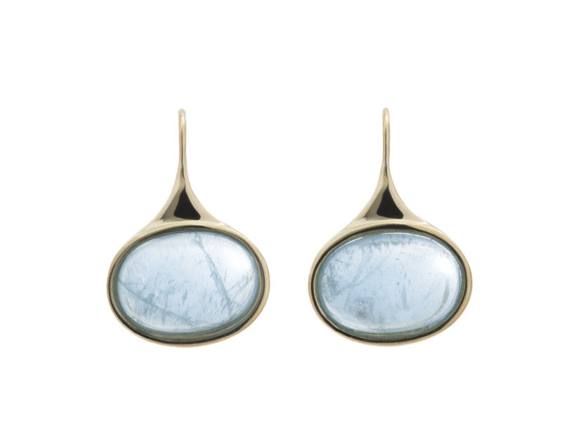Medium oval light blue aquamarine cabochons in green gold frame and shepherd's hooks.