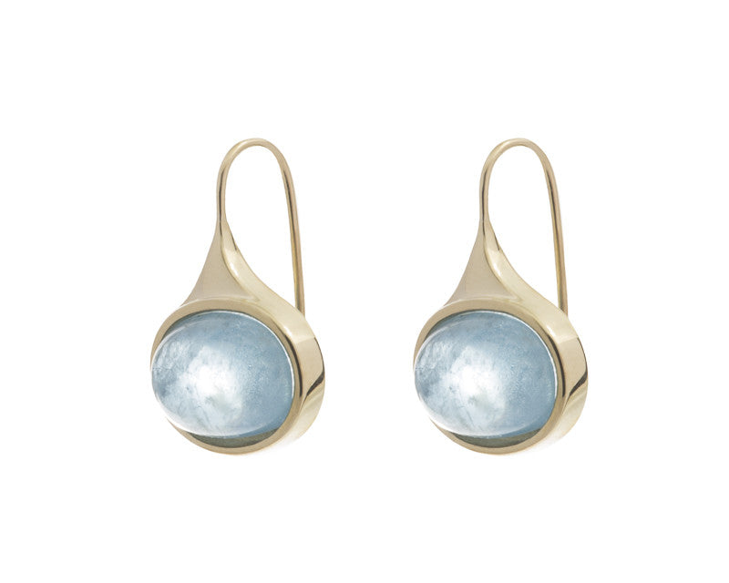 Medium oval light blue aquamarine cabochons in green gold frame and shepherd's hooks.