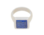 Large silver ring, square face set with rough blue lapis lazuli.