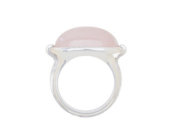 Very large silver ring, oval face set with pink quartz..