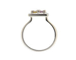 White gold ring with pedestal to square face set with pink and yellow sapphire.