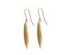 Long drop earrings in shape of vanilla bean in solid yellow gold.