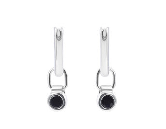 Very small round drops in white gold with balck onyx centres. Drops hang from small U shaped hoops in white gold.