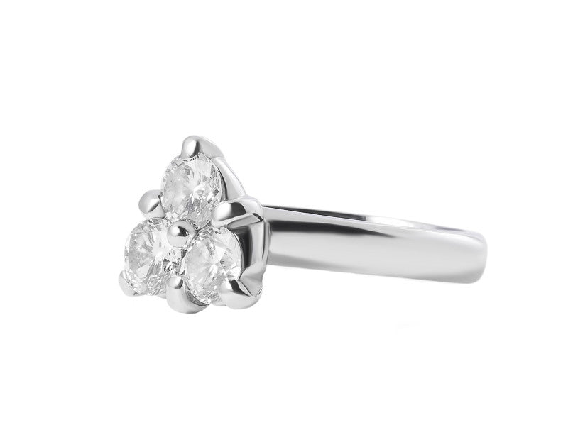 Three diamonds set in triangle, white gold.