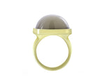 Big green gold ring with large square cabochon of grey moonstone.