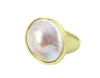 Very large ring with Mabé pearl in green gold .