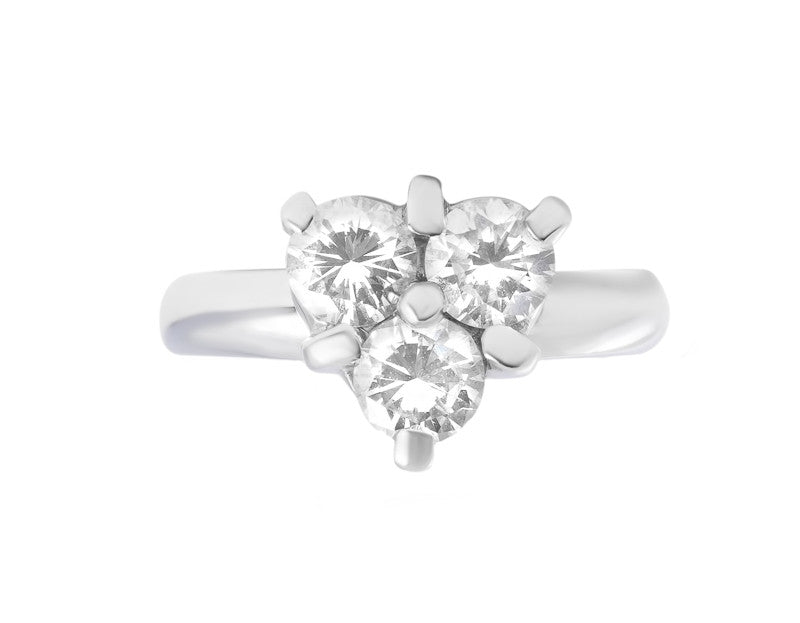 Three diamonds set in triangle, white gold.