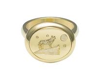 Medium oval signet ring in green 18k gold with whimsical wolf engraving..
