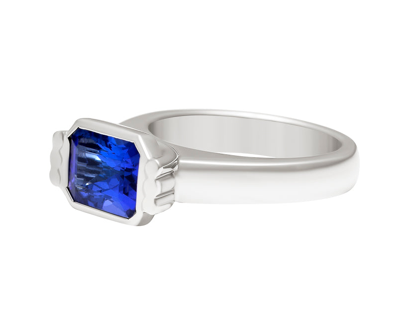 Purple-blue tanzanite platinum ring.