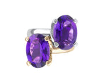 Two rings with oval amethyst prong set, white gold and rose gold.