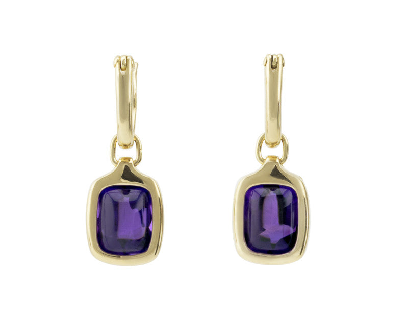 Rectangle drops with bright purple cabochon gem in green gold frame. Drops hang on small U shaped hoops in solid green gold.